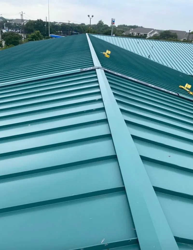 Green commercial metal roof ridge and valley for Metal Roof Repair in Pleasantville